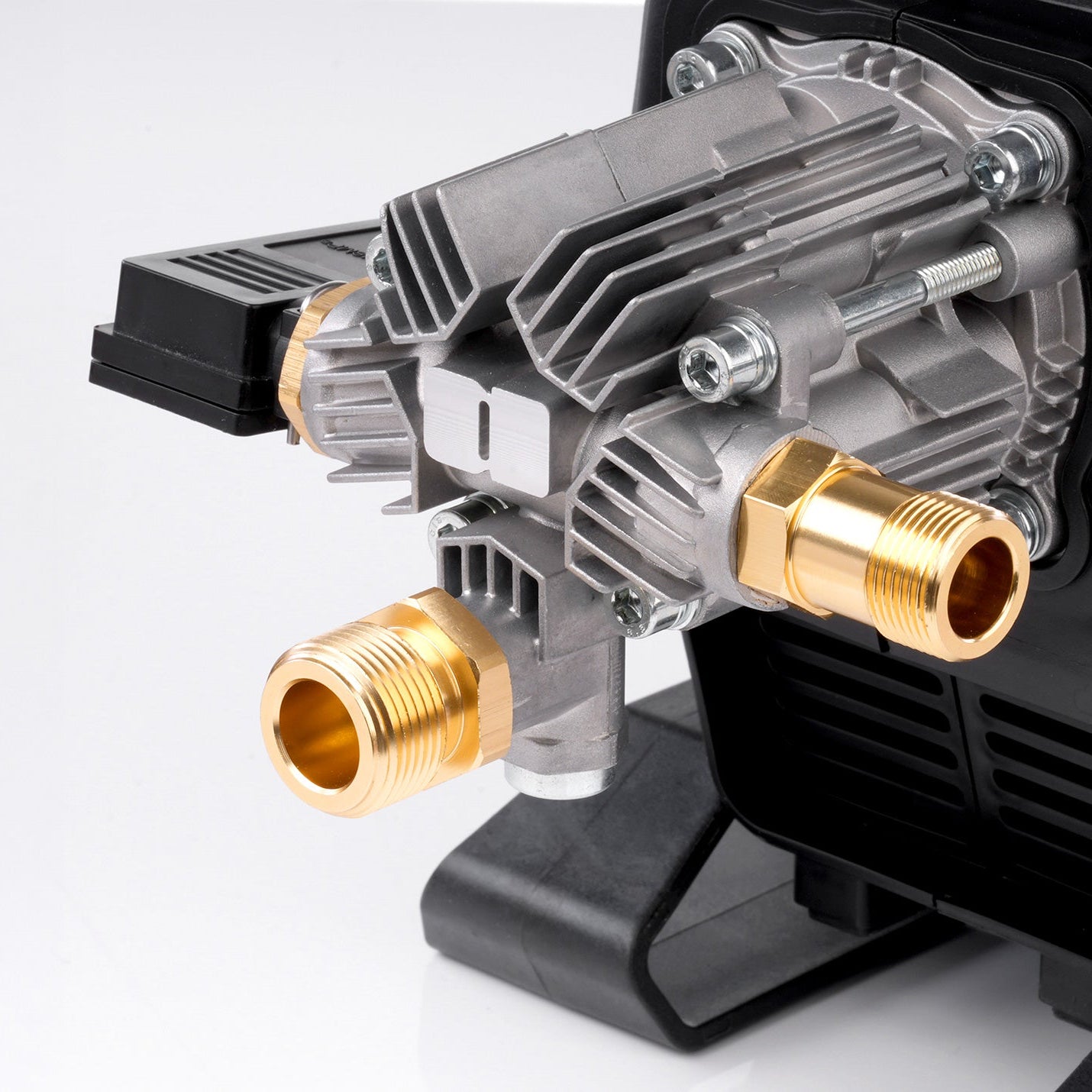 High-pressure pump with brass connectors on a white background