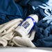 GYEON Towel Wash product among folded towels in a basket