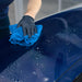 Person wiping away the Gyeon WaterSpot Remover residue