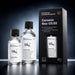 Two clear bottles of KookChemie Ceramics Neo C0.03 with black caps and a black product box, displayed on a dark reflective studio background.