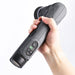 Hand holding a ShineMate EB210 Cordless Polisher with attachments on a white background with control buttons on a white background